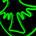 Neon light circle with a Christmas tree Color: green...